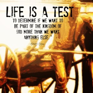 A statue of a Mormon pioneer pulling a handcart. And a quote about life being a test from Sheri Dew.